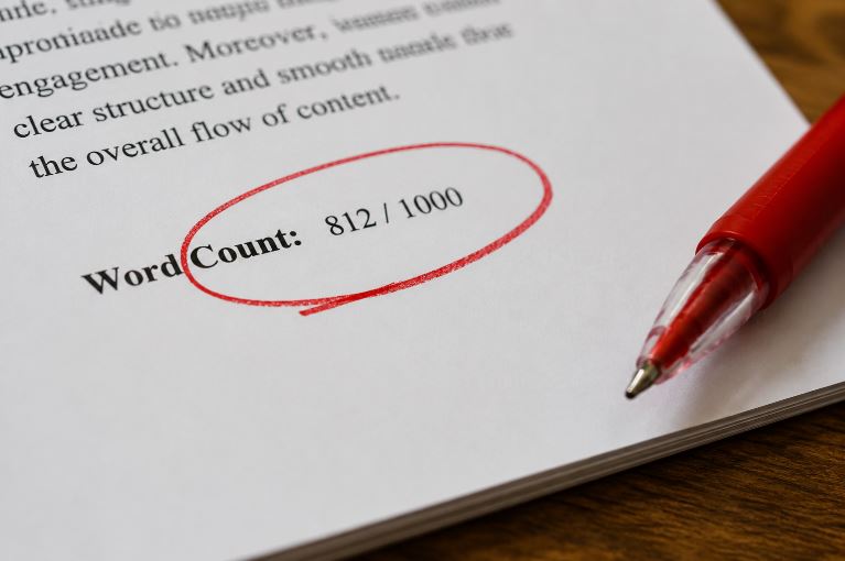 Printed document with “Word Count: 812 / 1000” circled in red pen